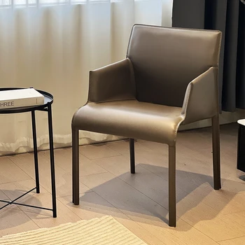 Обеденный стул в скандинавском минималистичном стиле, домашний подлокотник, кожаное седло, современная модель гостиничного кофейного кресла из нержавеющей стали для отдыха